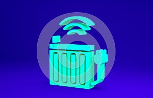 Green Smart heating radiator system icon isolated on blue background. Internet of things concept with wireless