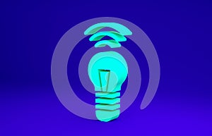 Green Smart light bulb system icon isolated on blue background. Energy and idea symbol. Internet of things concept with