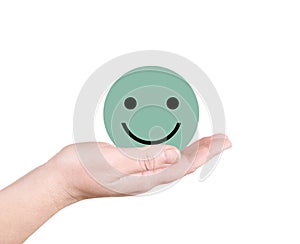 Green smiley on the palm