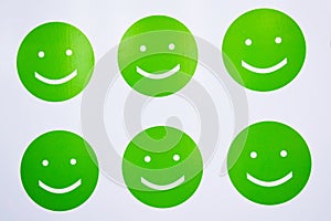 The green smilies on a white background.