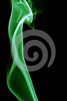 Green smoke on black background