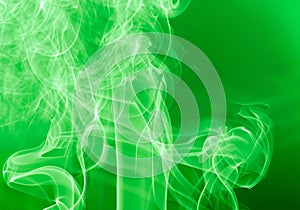 Green smoke texture on a black background