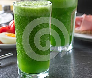 Green smoothie with cucumber, green apples and lambÂ´s lettuce