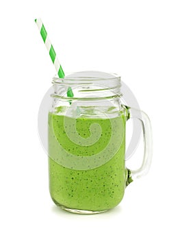 Green smoothie in a jar mug isolated