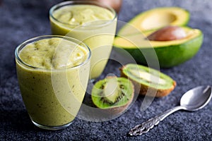Green smoothie kiwi banana and avocado. Fresh juicy green detox smoothie
