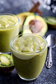 Green smoothie kiwi banana and avocado. Fresh juicy green detox smoothie