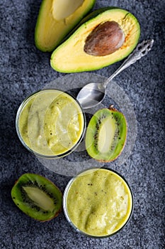 Green smoothie kiwi banana and avocado. Fresh juicy green detox smoothie