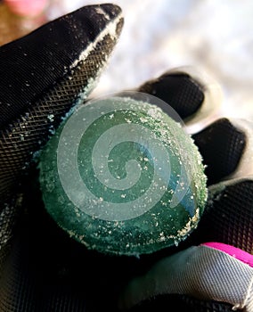 Green Snow marble on snow golves photo