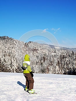 Green snowboarder