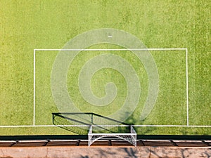 Green  soccer court in urban area, detail