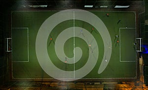 Green soccer field. Top view with drone shot