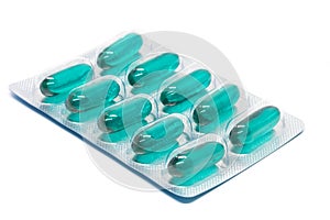 Green soft gel capsules pills in blister pack