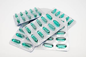 Green soft gel capsules pills in blister pack