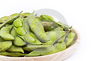 Green soybean with seeds Vegetable soybean boiled in wooden pl