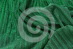 Green sparkle festive pleated background