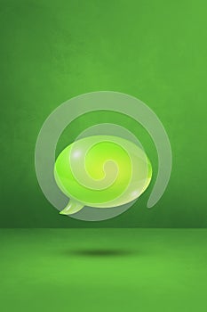 Green speech bubble on concrete wall vertical background