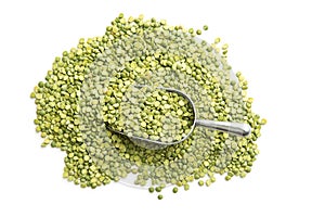 Green split peas in metal scoop.