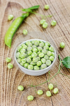 Green split peas in a white cup