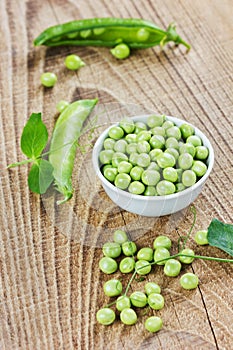 Green split peas in a white cup