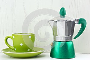 Green spotty mug and moka maker