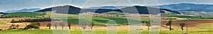 Green spring hills in Slovakia. April sunny countryside panorama