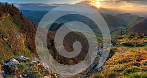 Green Spring Slovakia mountain nature landscape with sun and cross. Strazov hill in northwestern Slovakia