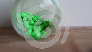 green and stainless round plastic bullets - okeeeee