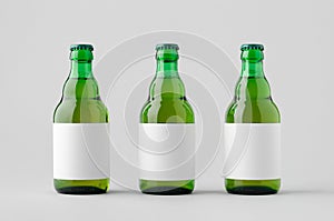 Green steinie beer bottle mockup with blank label