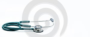 Green stethoscope isolated on white background with copy space. Medical tool for doctor. Health check up concept. Medical device