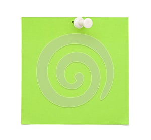 Green sticky note with pushpin