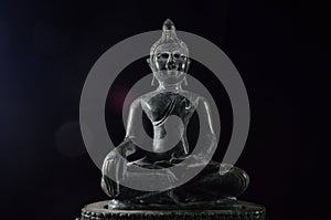 green stone buddha.Hand carved stone Buddha from Thailand.