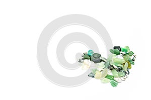 Green stones in heart shape isolated