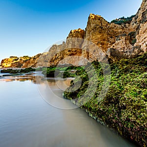 Green Stones at Porto de Mos Beach in Lagos, Algarve