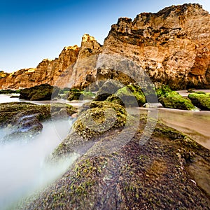 Green Stones at Porto de Mos Beach in Lagos, Algarve