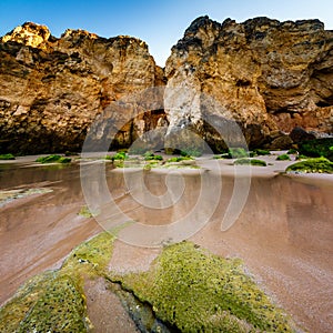 Green Stones at Porto de Mos Beach in Lagos, Algarve