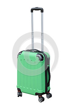 Green suitcase on wheels for travel