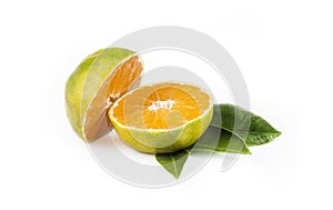 Green sweet isolated mandarin clementine tangerine on white background with leaf