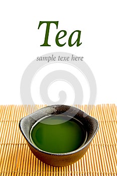 Green tea on bamboo mat(Green tea and chopsticks) with sample te