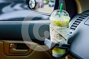 green tea in a car interior.