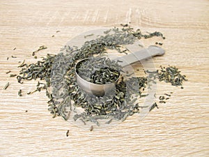 Green tea chun mee in tea spoon