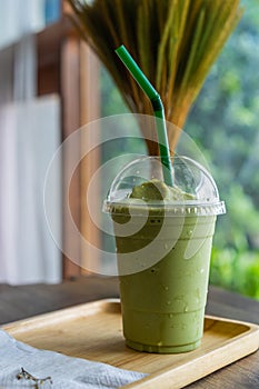 Green tea frappe in cafe photo
