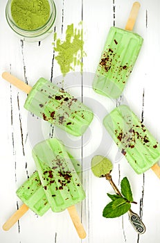 Green tea matcha mint popsicles with chocolate and coconut milk.