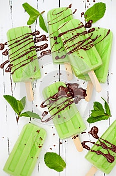 Green tea matcha mint popsicles with chocolate and coconut milk.