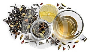 Green tea with natural flavors and a cup. Top view on white background