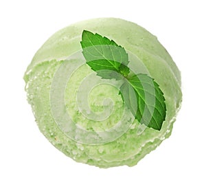 Green tea or pistachio ice cream ball with a mint leaf isolated on white background, top view