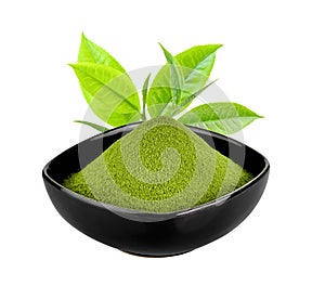 green tea powder in a bowl on white