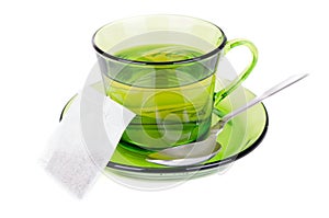 Green tea in transparent cup isolated on white