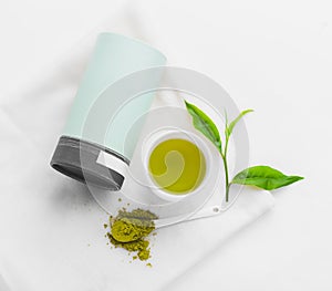 Green tea In white cup White background aroma