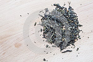 Green tea on wooden background.