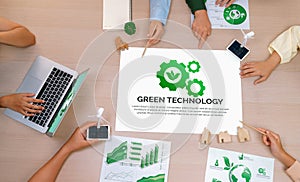 Green technology illustration placed at meeting table. Top view. Delineation.